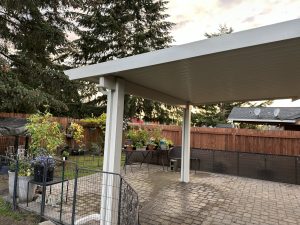 Flatpan Patio Cover With Maplewood Cedar Embossed Wrap And Scallopped Rafter Tails In Rochester 2