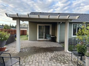 Flatpan Patio Cover With Maplewood Cedar Embossed Wrap And Scallopped Rafter Tails In Rochester 5