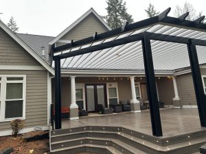 Polypanel Patio Cover With Black Cedar Embossed Wrap And Scalloped Rafter Tails In Gig Harbor 3